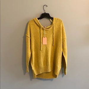 Yellow hooded sweater